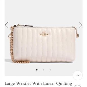 COACH - LARGE WRISTLET WITH LINEAR QUILTING